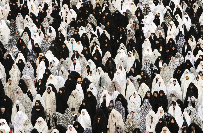 Women attend Friday prayers in Tehran February 4, 2011. (photo credit: REUTERS/RAHEB HOMAVANDI)