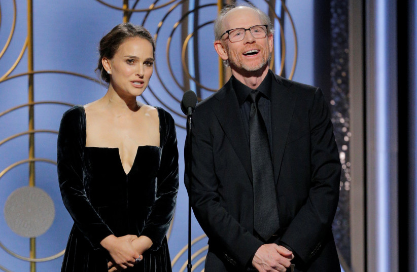 Presenter Natalie Portman and Ron Howard at the 75th Golden Globe Awards in Beverly Hills, California, US January 7, 2018.  (photo credit: HANDOUT/REUTERS)