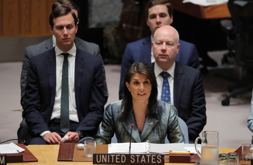 United States Ambassador to the United Nations (UN) Nikki Haley speaks in front of White House senior adviser Jared Kushner during a meeting of the UN Security Council at UN headquarters in New York, U.S., February 20, 2018.  (photo credit: REUTERS)