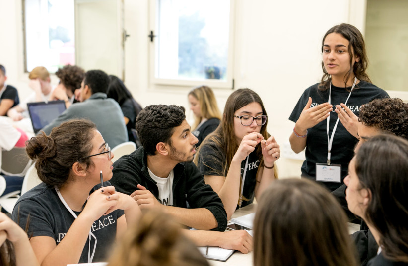 More than 70 11th grade students from 17 countries at the Eastern Mediterranean International Boarding School reached a peace agreement in a 24-hour simulation of Israeli-Palestinian peace talks held the week of February 21-22 2018 at the Charney Resolution Center. (Illustrative)) (photo credit: IFAT GOLAN)