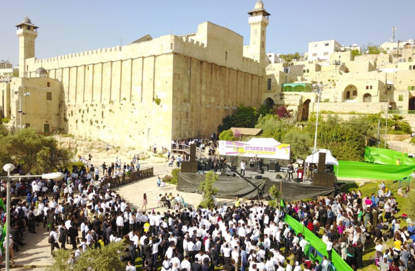 Jews at the Tomb of the Patriarchs in Hebron over the Passover holiday (photo credit: IDF SPOKESPERSON'S UNIT)