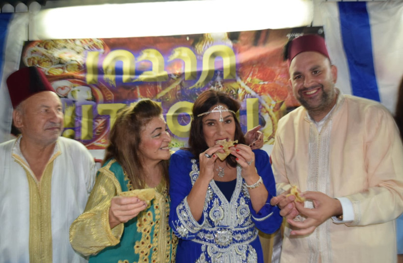 Minister of Culture and Sports Miri Regev opens the Mimouna celebrations at the home of the Mayor of Lod Yair Revivo, April 2018 (photo credit: Courtesy)