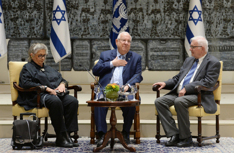 President Reuven Rivlin (C) and Nechama Rivilin (L) host a Zikaron BaSalon event on April 10, 2018. (photo credit: Mark Neiman/GPO)