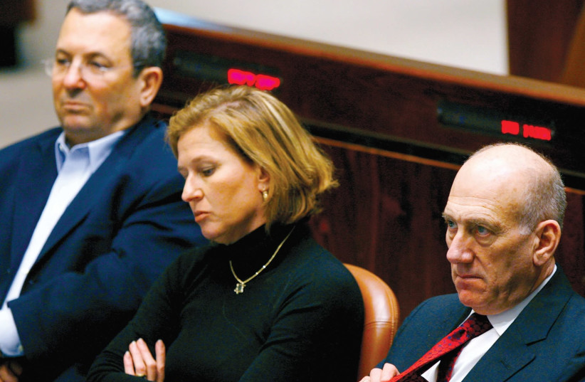 THEN-PRIME MINISTER Ehud Olmert (right), foreign minister Tzipi Livni and defense minister Ehud Barak attend a special session in the Knesset marking Holocaust Remembrance Day in 2008. (photo credit: REUTERS)