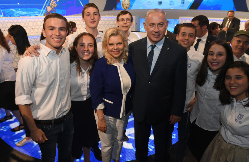 PM Benjamin Netanyahu and wife Sara Netanyahu at the International Bible Quiz (photo credit: GPO)