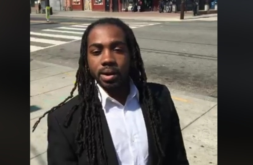 Councilman Trayon White Sr. records a video on a street corner in Washington, DC (photo credit: screenshot)