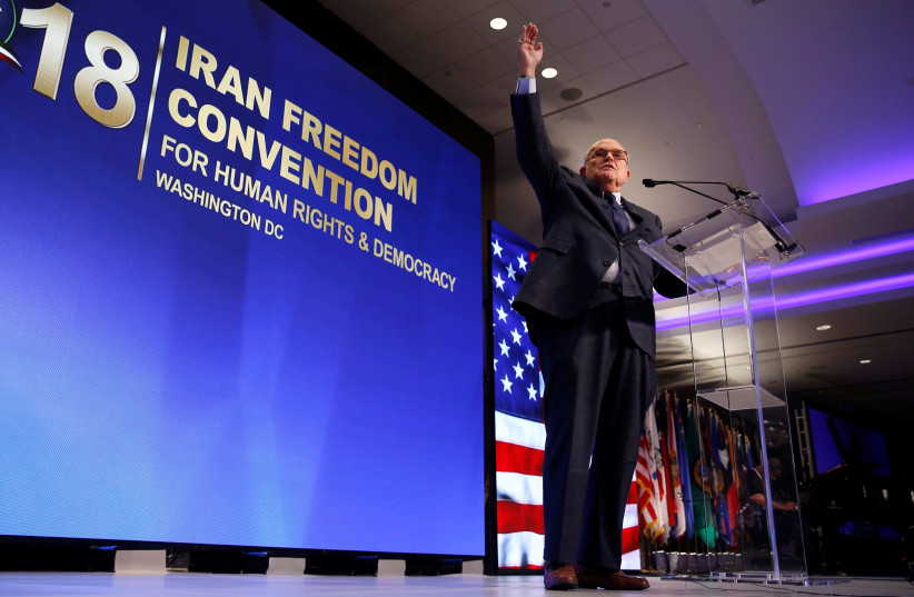 Former New York Mayor Rudy Giuliani speaks at the 2018 Iran Freedom Convention in Washington, DC, May 5, 2018 (photo credit: JOSHUA ROBERTS / REUTERS)