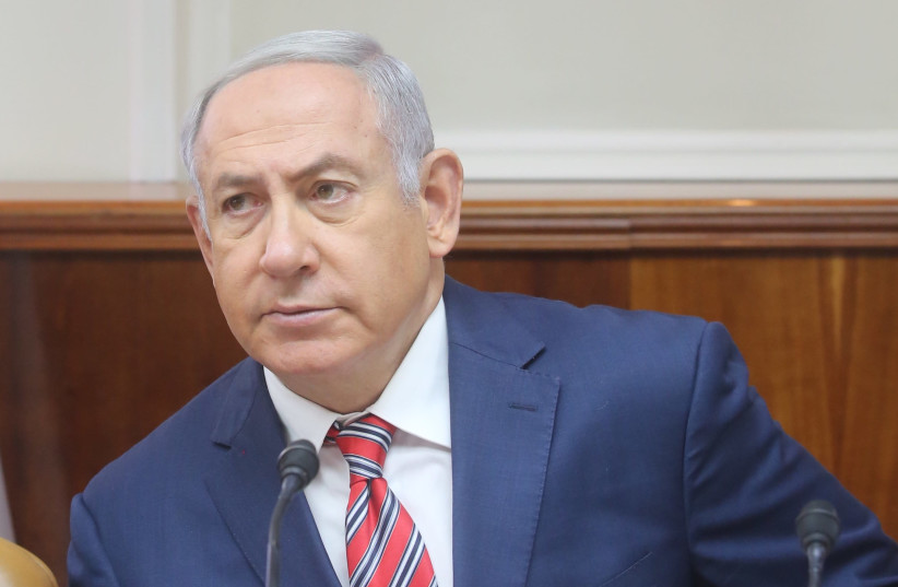 Prime minister Benjamin Netanyahu at a cabinet meeting, June 17, 2018. (photo credit: MARC ISRAEL SELLEM)