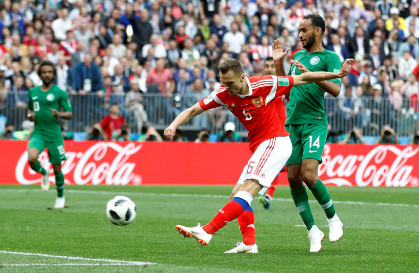 RUSSIA’S DENIS Cheryshev scores their second goal in the the Russia vs Saudi Arabia World Cup match on June 14 in Moscow’s Luzhniki Stadium (photo credit: REUTERS)