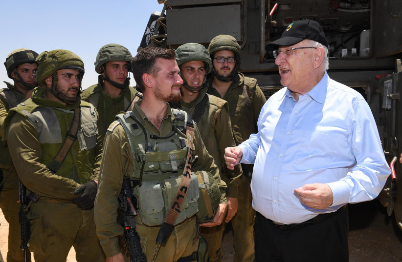 President Reuven Rivlin meets IDF soldiers at Shivta base, July 11, 2018 (photo credit: Mark Neiman/GPO)