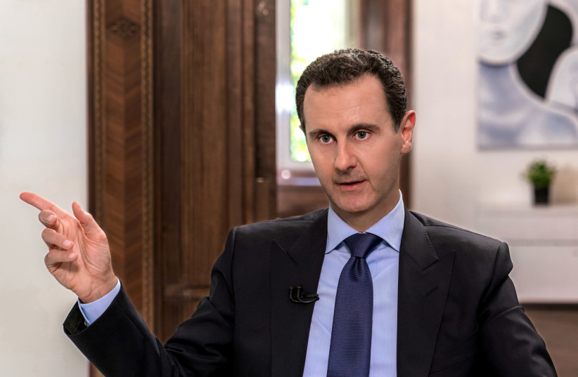 Syrian President Bashar Assad speaks during an interview with Russian television channel NTV, in Damascus, Syria in this handout released on June 24, 2018.  (photo credit: SANA/REUTERS)