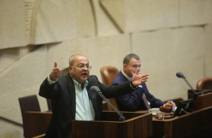 MK Ahmad Tibi (Joint List)  at the Knesset during a discussion on the Nation-State Law August 8, 2018. (photo credit: MARC ISRAEL SELLEM/THE JERUSALEM POST)