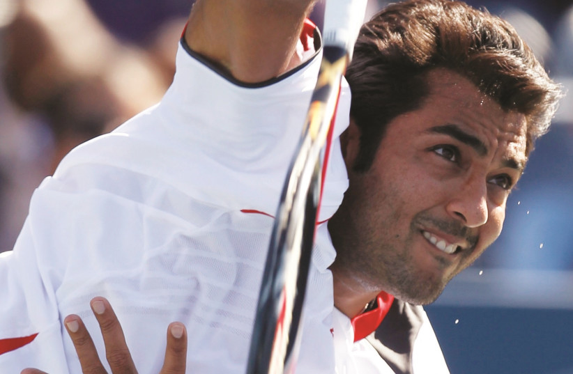 Aisam-Ul-Haq Qureshi has used his platform as a professional tennis player to improve relations between people of various cultures and religions, regularly teaming up with Israelis and others in doubles tournaments (photo credit: REUTERS)