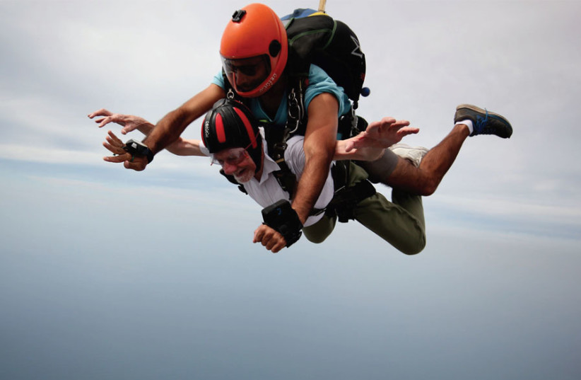 Walter Bingham skydiving with an Israel Extreme instructor over northern Israel (photo credit: ISRAEL EXPERIENCE)