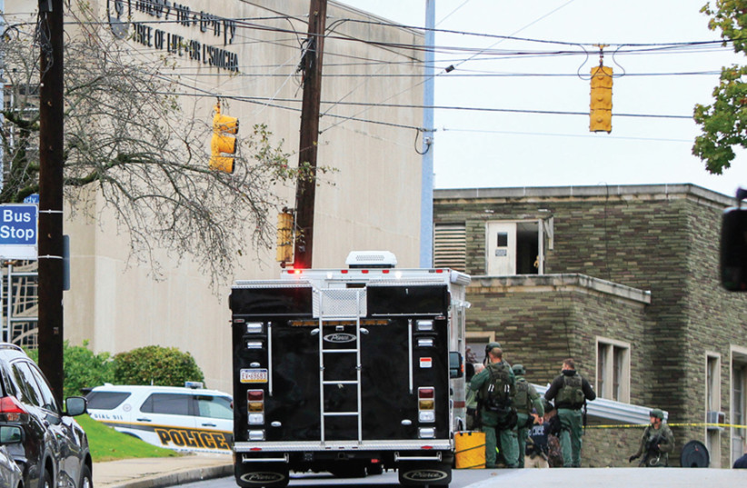 Police near the "Tree of Life" synagogue in Pittsburgh (photo credit: REUTERS)