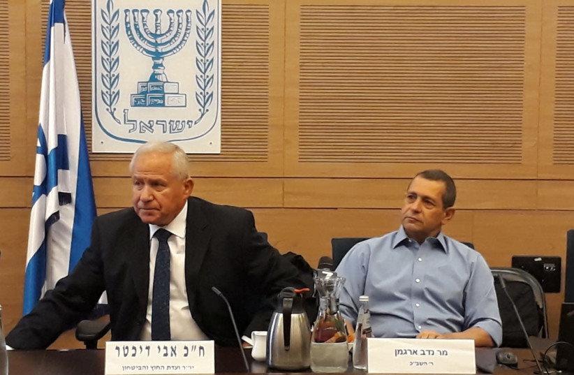 Shin Bet head Nadav Argaman and MK Avi Dichter, October 6, 2018 (photo credit: ARIK BENDER/MAARIV)