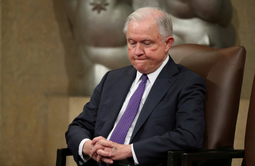 U.S. Attorney General Jeff Sessions waits to speak at a National Opioid Summit at the Justice Department in Washington,. October 25, 2018 (photo credit: REUTERS/JONATHAN ERNST/FILE PHOTO)