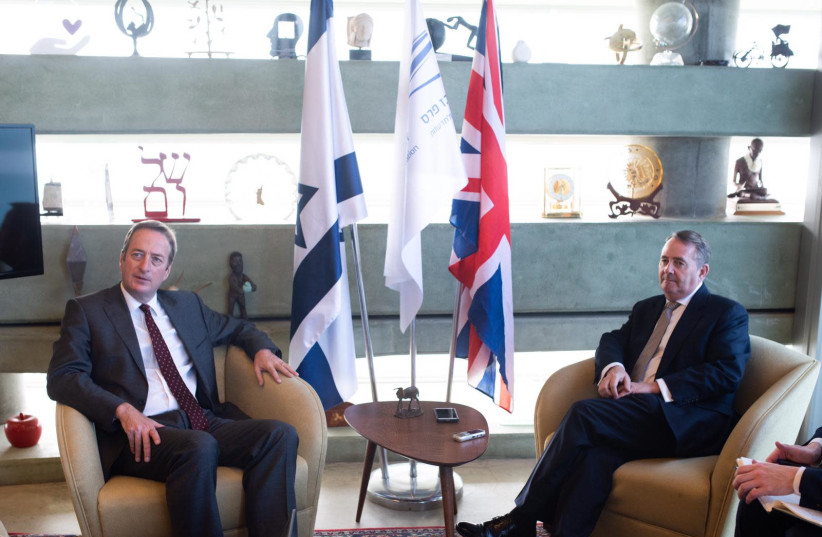 UK Secretary of State for International Trade, Liam Fox MP (right) and British Ambassador to Israel David Quarrey at Peres Centre for Peace and Innovation, November 27, 2018 (photo credit: BEN KELMER)