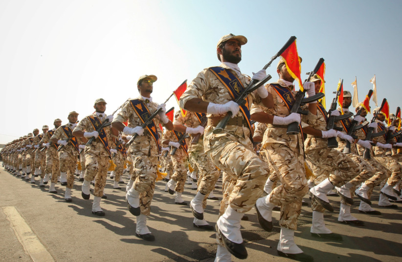 Members of the Iranian Revolutionary Guards march during a parade to commemorate the anniversary of the Iran-Iraq war (1980-88), in Tehran September 22, 2011. (photo credit: REUTERS/STRINGER)