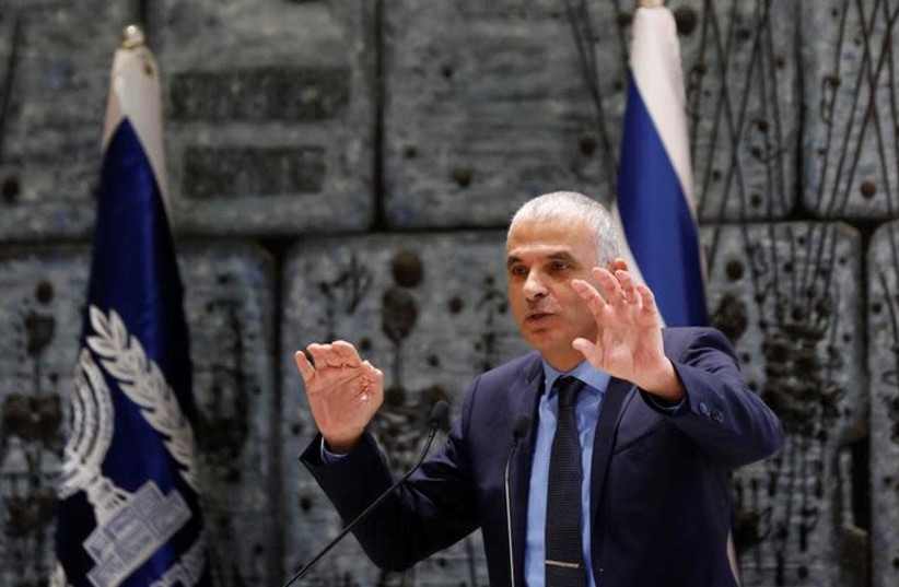 Finance Minister Moshe Kahlon speaks during a ceremony whereby Amir Yaron is sworn in as Bank of Israel governor by President Reuven Rivlin, in the presence of Prime Minister Benjamin Netanyahu, in Jerusalem December 24, 2018 (photo credit: AMIR COHEN/REUTERS)