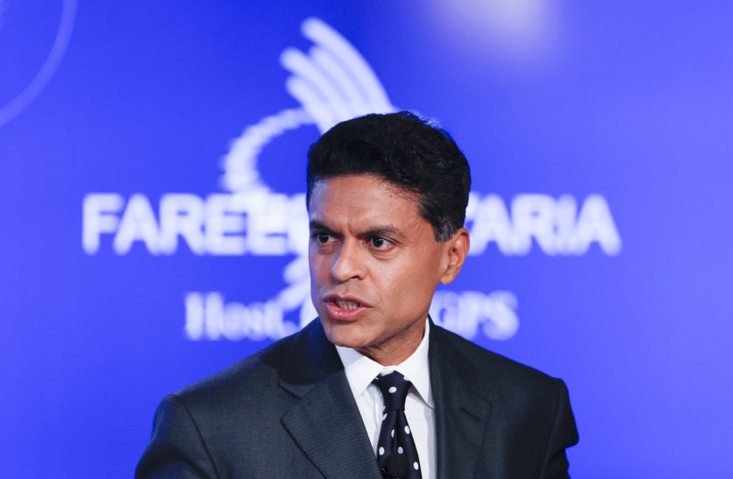Television journalist Fareed Zakaria hosts a group discussion on "Business by Design: Business with Integrity" during the second day of the Clinton Global Initiative 2012 (CGI) in New York on September 24, 2012. (photo credit: LUCAS JACKSON / REUTERS)