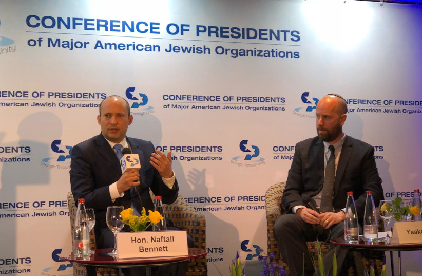 Minister of Education Naftali Bennet with Jerusalem Post Editor-in-Chief Yaakov Katz at the Conference of Presidents of Major American Jewish Organizations, Feb. 18, 2019. (photo credit: YANIR COZIN / MAARIV)