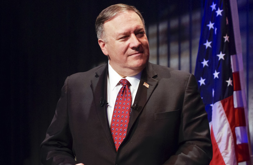 U.S. Secretary of State Pompeo listens during a news conference in Reykjavik (photo credit: ASGEIR ASGEIRSSON/REUTERS)