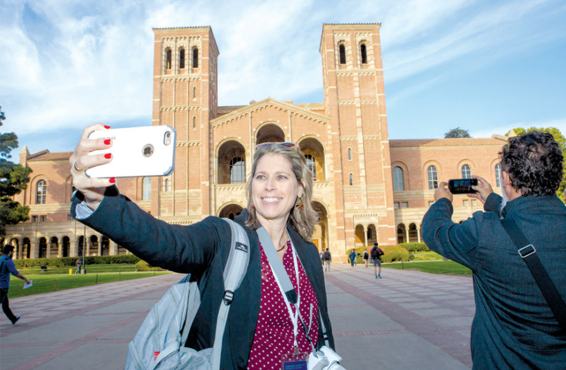 TAL SCHNEIDER, part of the delegation to Los Angeles, snaps a selfie. (photo credit: GESHER)