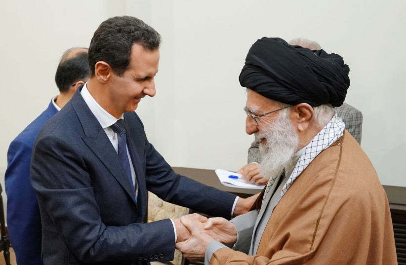 Syria's President Bashar al-Assad meets with Iranian Supreme Leader Ayatollah Ali Khamenei in Tehran (photo credit: SANA/REUTERS)