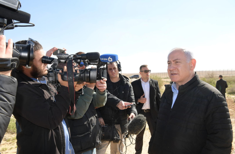 Prime Minister Benjamin Netanyahu on the Sinai border, March 7th, 2019 (photo credit: AMOS BEN-GERSHOM/GPO)