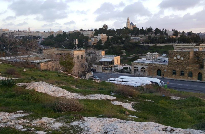 A view of Jerusalem's Valley of Hinnom with Hebron Road in the foreground and Mount Zion in the background taken from near the First Station complex (photo credit: BEN BRESKY)