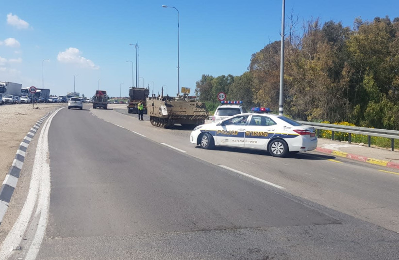 An IDF armored pesonnel carrier on the side of the road, March 26th, 2019 (photo credit: ISRAEL POLICE)