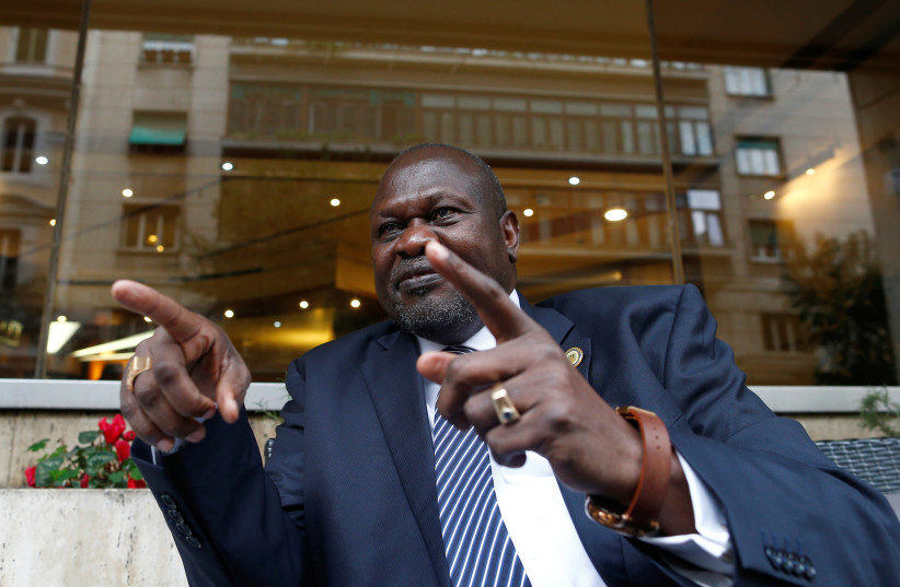 South Sudan's ex-vice president and former rebel leader Riek Machar gestures during an interview with Reuters in Rome, Italy, April 12, 2019 (photo credit: YARA NARDI / REUTERS)
