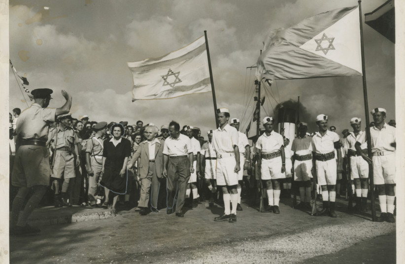 Israeli fighters seen welcoming the first Israeli Prime Minister, David Ben-Gurion (photo credit: KEDEM AUCTION HOUSE)