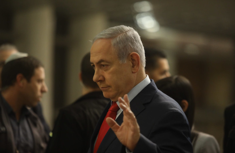 Prime Minister Benjamin Netanyahu arrives at the Knesset ahead of the vote on whether it will disperse, May 29 (photo credit: MARC ISRAEL SELLEM)