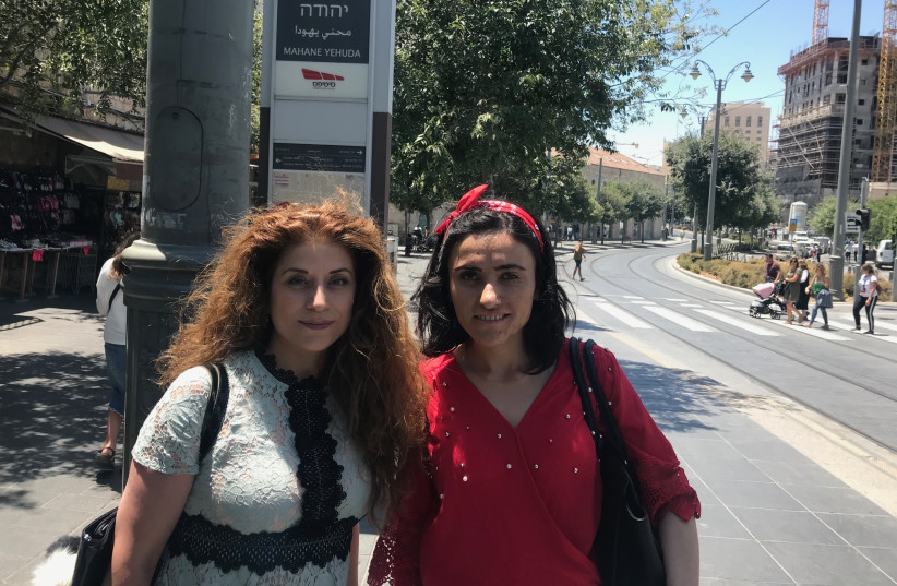 Genocide researcher  Frishta Kewe and survivor Lamya Aji Bashar Taha in Jerusalem last week (photo credit: SETH J. FRANTZMAN)