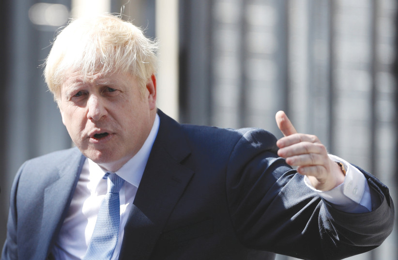 BRITAIN’S PRIME Minister Boris Johnson – he might ignite a post-Brexit Britain prosperity and instill in Britain a new spirit of confidence. (photo credit: HANNAH MCKAY/ REUTERS)