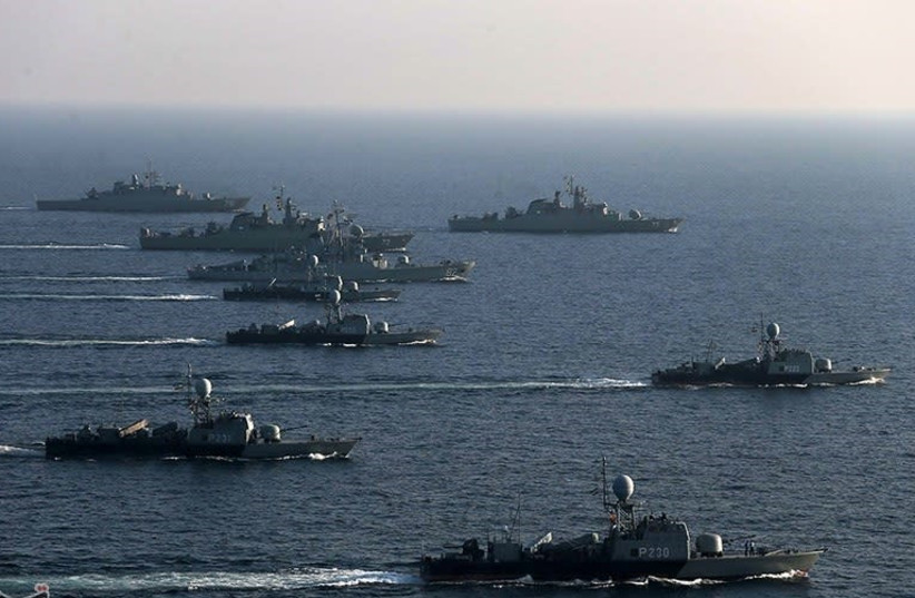 Iranian Navy ships on a training exercise (photo credit: Wikimedia Commons)