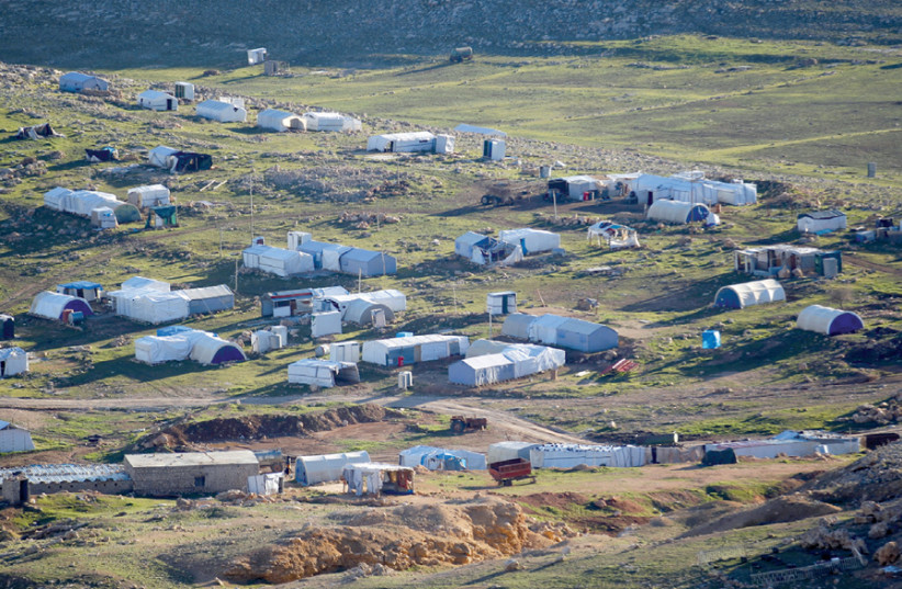 A general view of the Yazidi refugee camp on Mount Sinjar (photo credit: KHALID AL MOUSILY / REUTERS)
