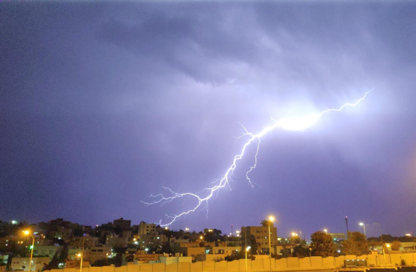 Lightning strikes over the Beit Safafa neighborhood in Jerusalem, Oct. 14, 2019 (photo credit: YOSSI ZE'EVI)