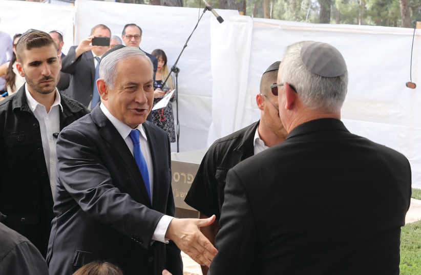 WILL THEY meet in the next government? Prime Minister Benjamin Netanyahu and Benny Gantz at the memorial for Shimon Peres last month (photo credit: MARC ISRAEL SELLEM/THE JERUSALEM POST)