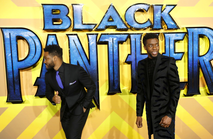 Actor Chadwick Boseman and Director Ryan Coogler arrive at the premiere of the new Marvel superhero film 'Black Panther' (photo credit: PETER NICHOLLS/REUTERS)