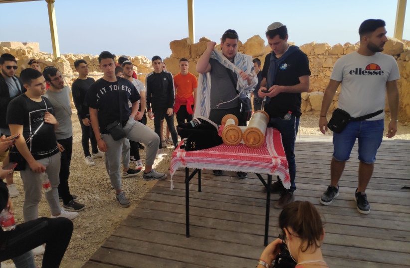 A group of French Jewish students visiting Israel with Israel Experience pray on top of Masada. (photo credit: Courtesy)