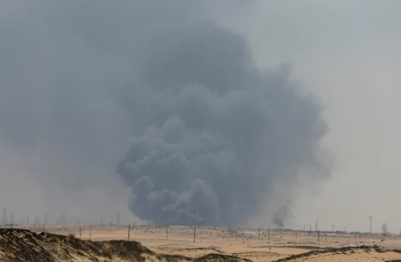 Smoke is seen following a fire at Aramco facility in the eastern city of Abqaiq, Saudi Arabia, September 14, 2019 (photo credit: REUTERS/STRINGER/FILES)