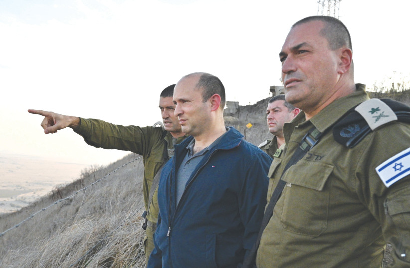 Defense Minister Naftali Bennett during a recent visit to the Syrian border  (photo credit: ARIEL HERMONI / DEFENSE MINISTRY)