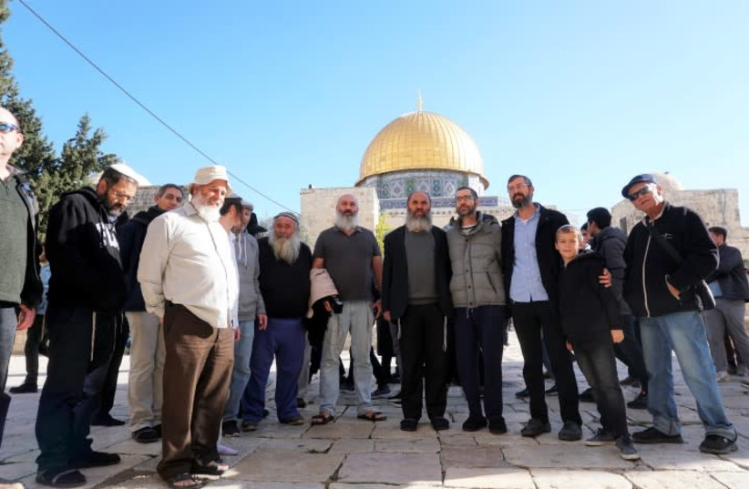 Rabbi Ram HaCohen and other Jewish visitors on the Temple Mount during Hanukkah 2019 (photo credit: HAIM KROIZER)
