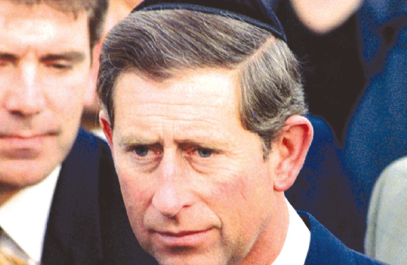 PRINCE CHARLES joins the funeral procession of prime minister Yitzhak Rabin in November 1995. (photo credit: KEVIN LAMARQUE/REUTERS)