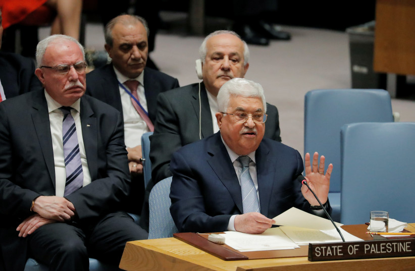 Palestinian President Mahmoud Abbas speaks during a meeting of the United Nations (UN) Security Council at UN headquarters in New York, U.S., February 20, 2018 (photo credit: REUTERS/LUCAS JACKSON)