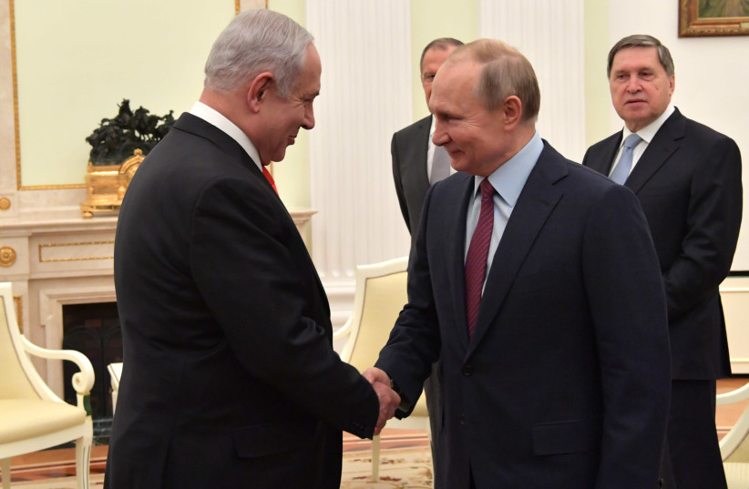 Prime Minister Benjamin Netanyahu meets with Russian President Vladimir Putin, January 30, 2020 (photo credit: KOBI GIDEON/GPO)