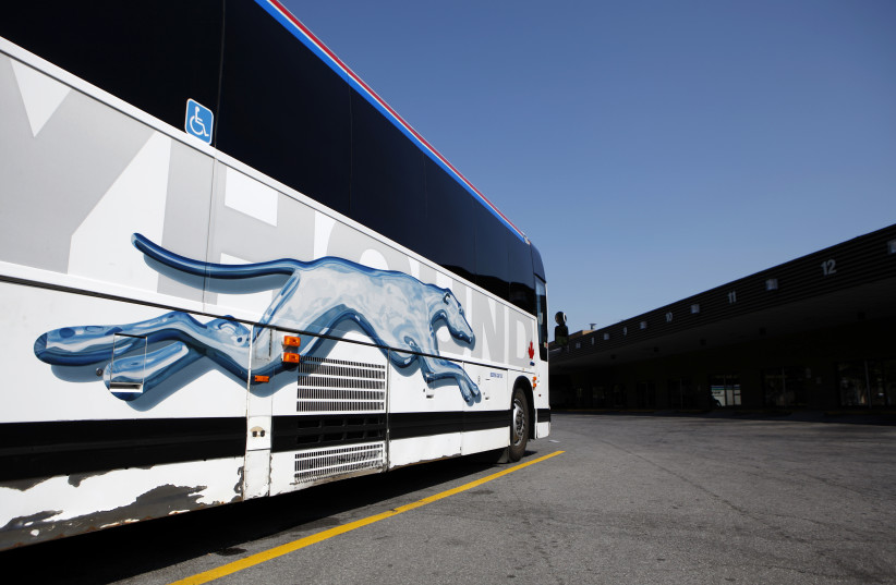 A Greyhound bus is parked at a bus terminal in Ottawa September 3, 2009. Greyhound Canada will pull out of Manitoba and northern Ontario starting next month and warned on Thursday it may end bus service across Western Canada unless it receives government assistance (photo credit: REUTERS//BLAIR GABLE)